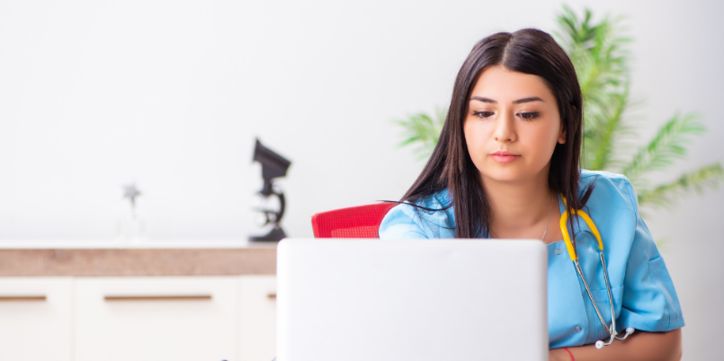 Nurse using laptop