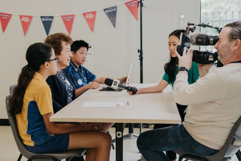 People in a interview with a TV program