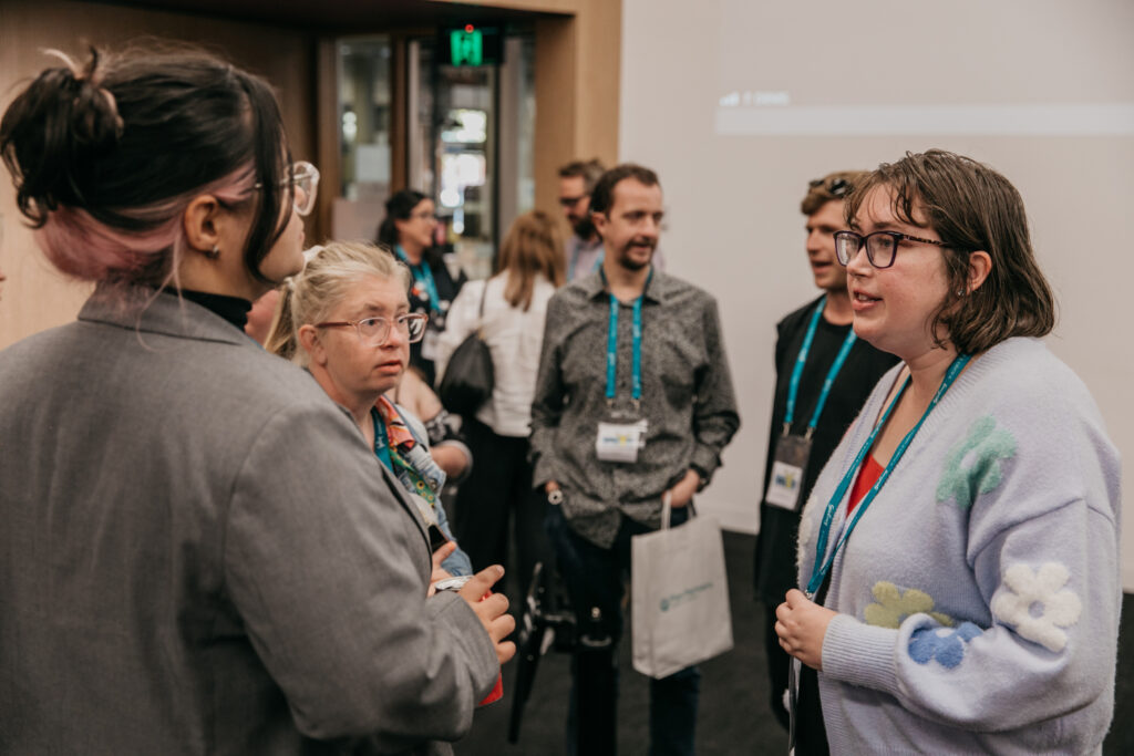Digital Champions talking to a group of people