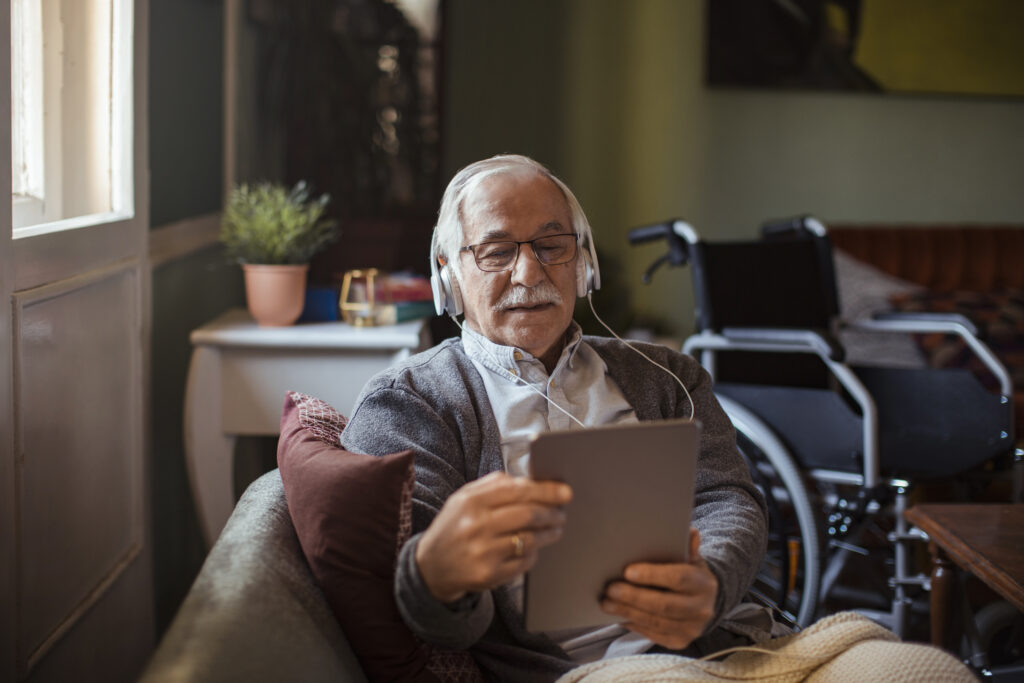 Senior Man using a Tablet at Home